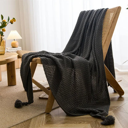 Soft Knitted Blanket with Elegant Tassel Accents